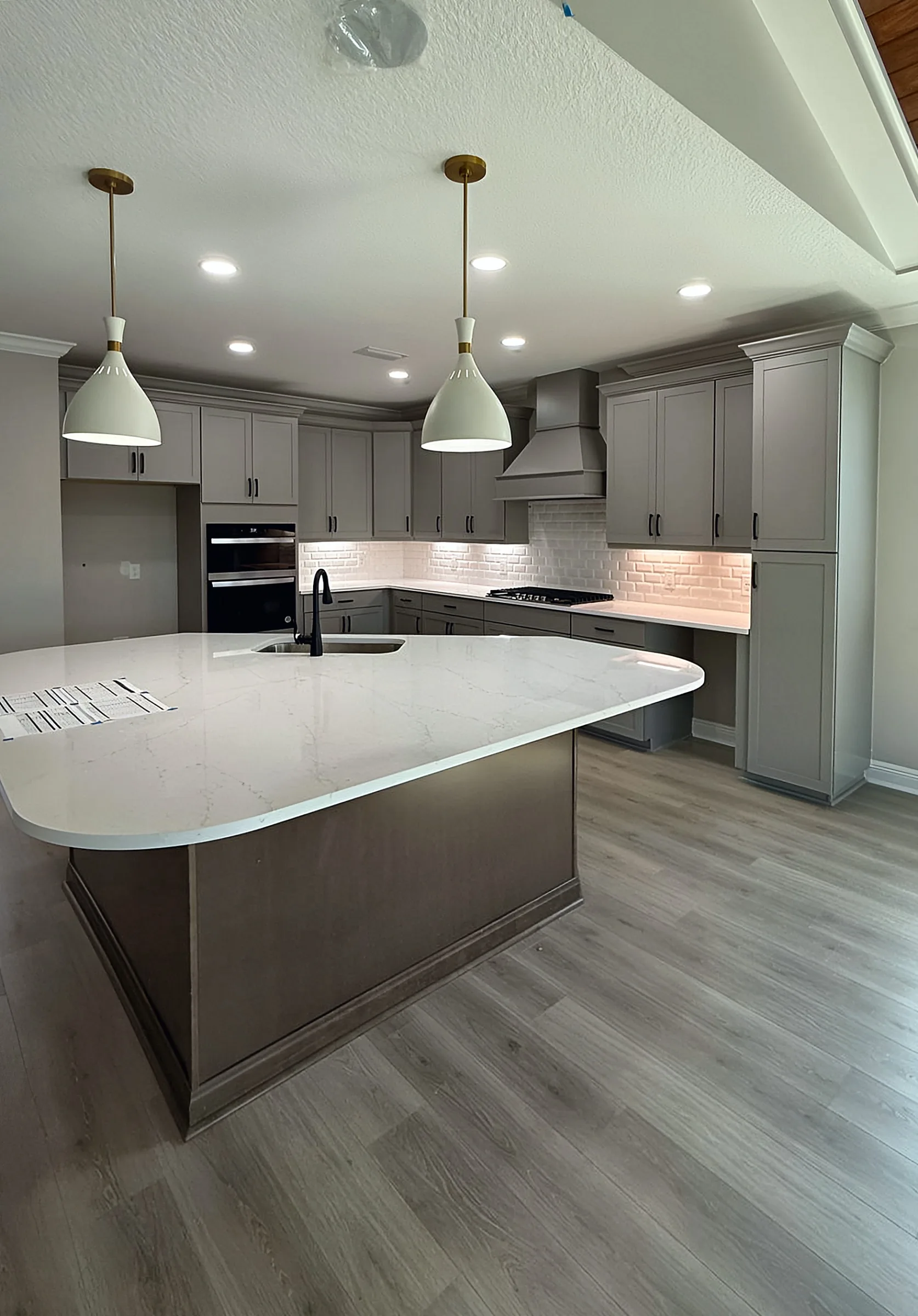 Gray Shaker Kitchen with Curved Island — Panama City Beach