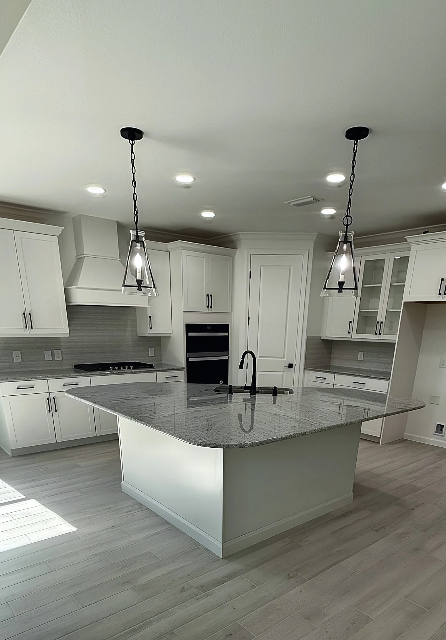 White Kitchen with Glass-Front Uppers — Panama City Beach